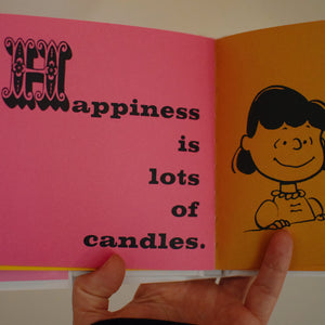 Happiness is a Warm Puppy (PEANUTS) - Hardcover Book By Charles M. Schulz