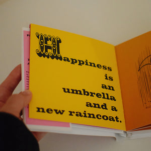 Happiness is a Warm Puppy (PEANUTS) - Hardcover Book By Charles M. Schulz